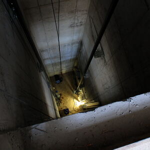 The elevator shaft, seen from the 2nd floor. The guide rails are fixed.