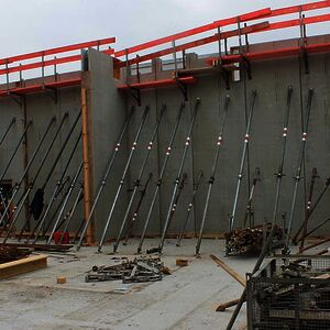 The newly erected walls have still to be supported…