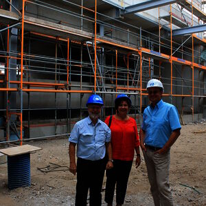 A visit from Mexico: Our Mexican dealer and his wife (both with blue helmets) are the very first dealers entering our new building…