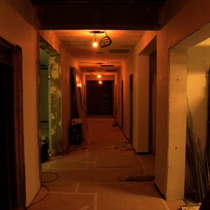 The hallway in the basement still looks a little bit “uncomfortable”…