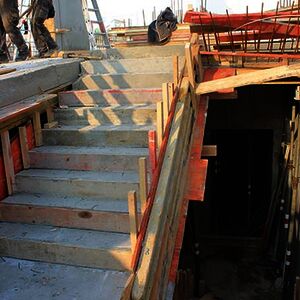 View from the staircase into the basement for the future social space …