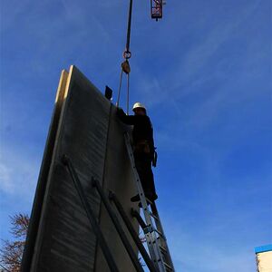 … meanwhile on the other side of the site huge 5 m high fire barriers are erected.