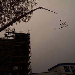 … then it was lifted by a crane to its future location. The little dab next to the “flying frame” could have been a plane – but there is no plane seen on the other photos. The photographer swears that there was absolutely no plane around at this time! The Truth is out there, somewhere