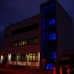 Beginning of April 2016: Almost complete! Our new building, photo taken at 9 p.m. The staircase seem to glow in bright blue colour from within itself!